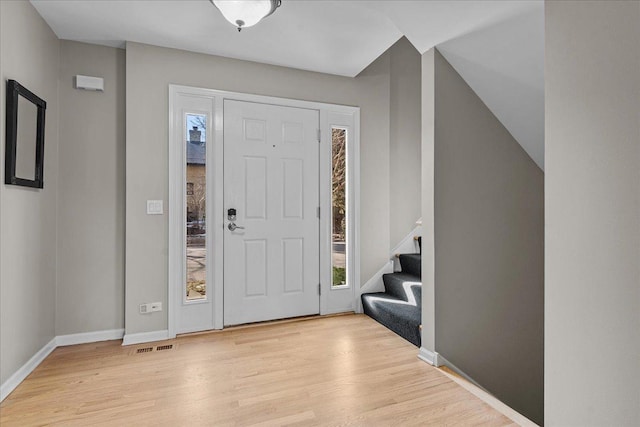 foyer with light wood-type flooring