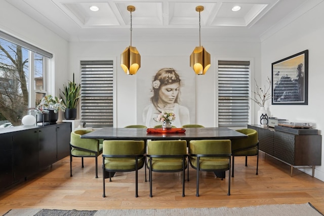 dining room featuring crown molding, light wood-type flooring, beam ceiling, and coffered ceiling