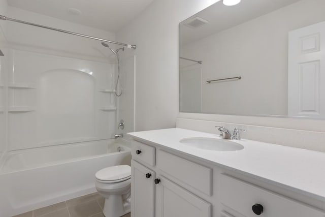 full bathroom featuring tile patterned flooring, vanity, bathing tub / shower combination, and toilet