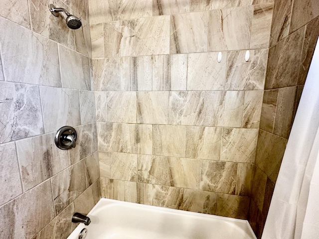 bathroom featuring shower / bath combination with curtain