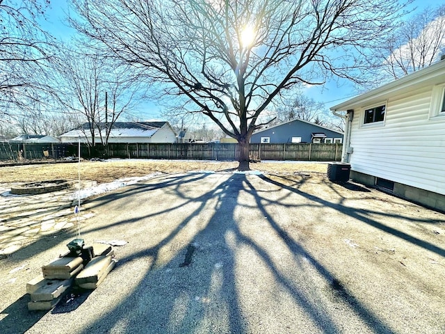 view of yard featuring central AC