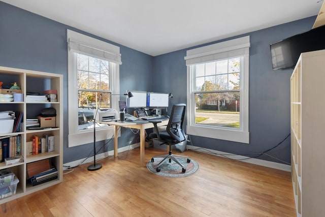 home office featuring light hardwood / wood-style flooring