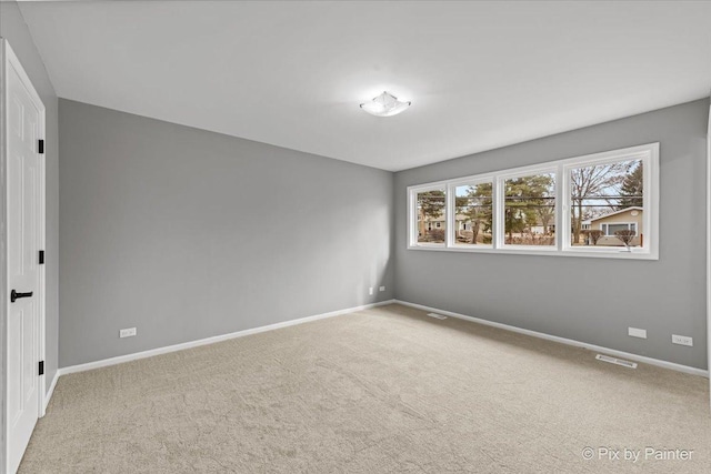 empty room with carpet floors