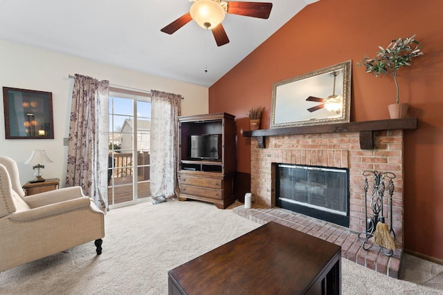 carpeted living room with a fireplace, vaulted ceiling, and a ceiling fan