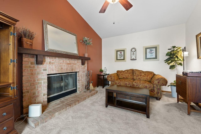 living room with lofted ceiling, a brick fireplace, carpet flooring, and ceiling fan