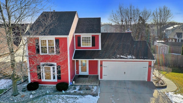 front of property featuring a garage