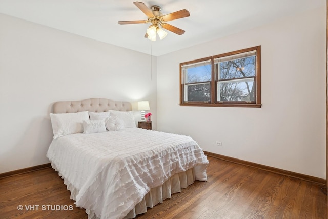 bedroom with hardwood / wood-style flooring and ceiling fan