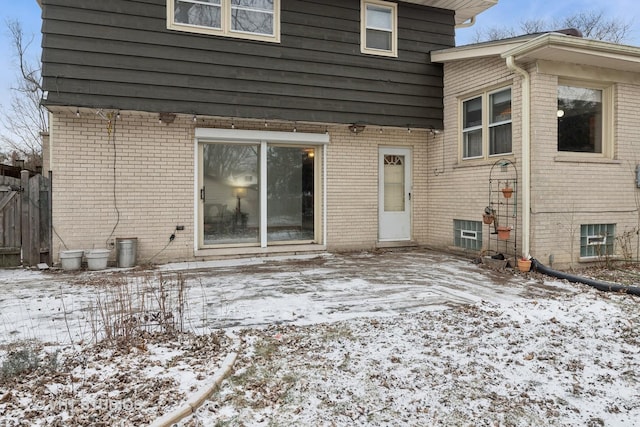 view of snow covered property