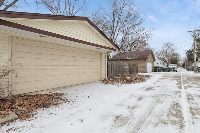 view of snow covered garage