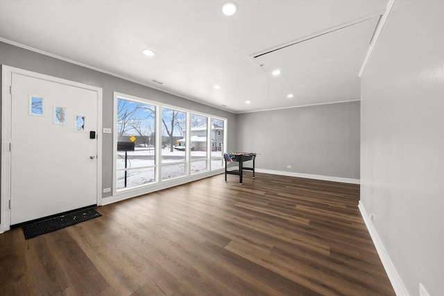 interior space featuring dark hardwood / wood-style floors and crown molding