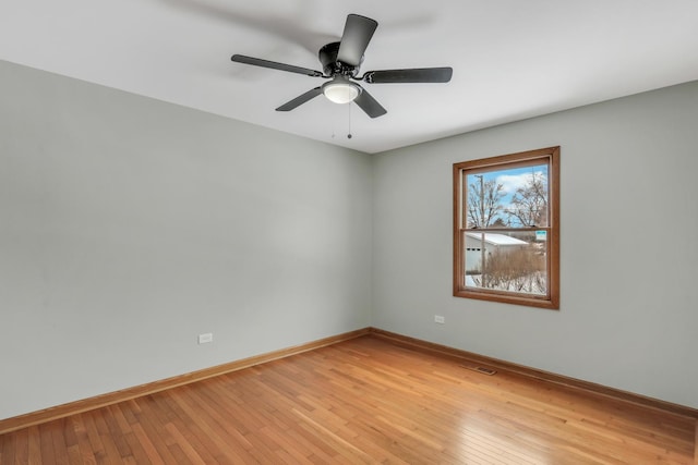 unfurnished room with ceiling fan and light hardwood / wood-style floors