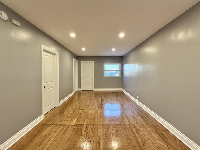 empty room with light wood-type flooring