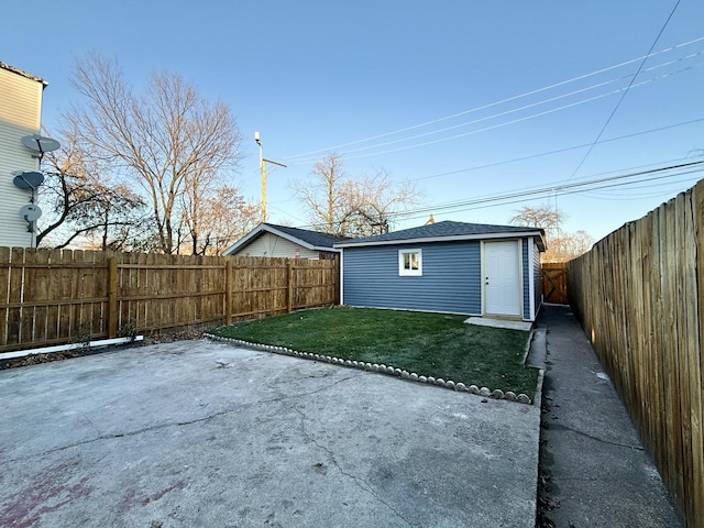 exterior space with an outbuilding and a patio