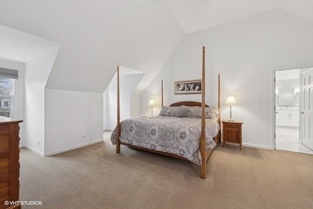 carpeted bedroom featuring vaulted ceiling