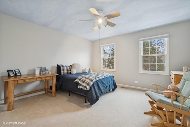 bedroom featuring ceiling fan and carpet flooring