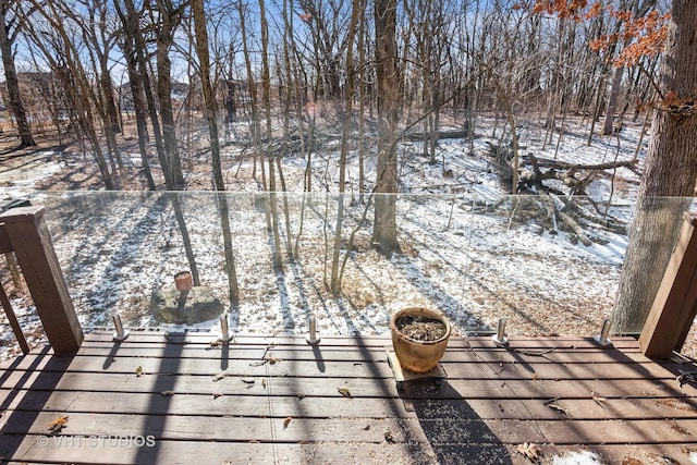 view of snow covered deck