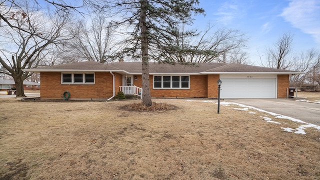 ranch-style home with a garage