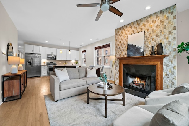 living room with light hardwood / wood-style floors