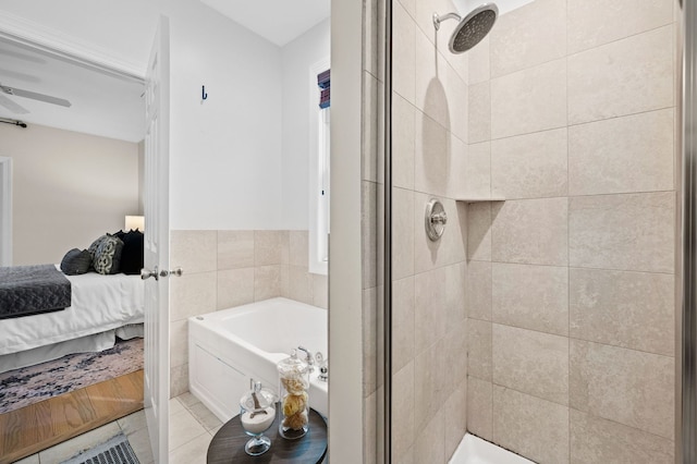 bathroom featuring separate shower and tub and tile patterned floors