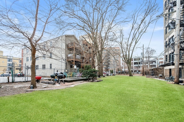 view of home's community featuring a yard