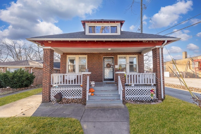 bungalow featuring covered porch