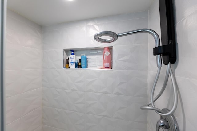 room details with a tile shower