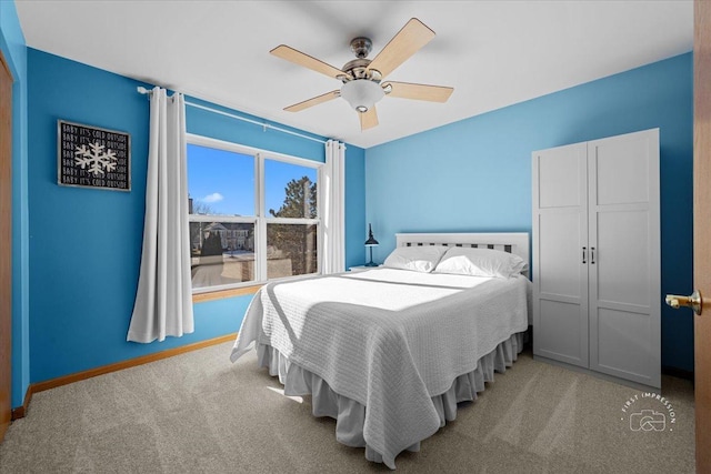 bedroom with carpet floors and ceiling fan