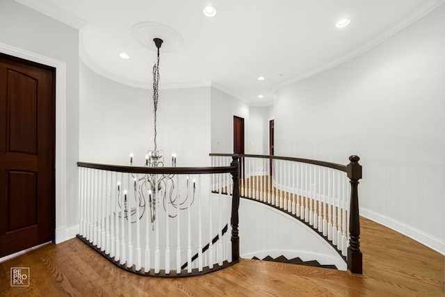 840 Chestnut St, Hinsdale, IL 60521 - stairs with a chandelier, recessed lighting, wood finished floors, baseboards, and ornamental molding