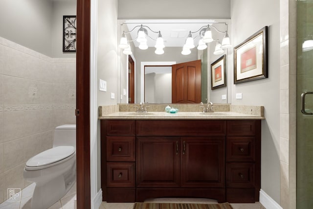 840 Chestnut St, Hinsdale, IL 60521 - bathroom featuring toilet, double vanity, a tile shower, and tile walls
