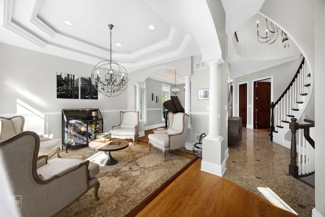 840 Chestnut St, Hinsdale, IL 60521 - interior space featuring ornate columns, a chandelier, arched walkways, recessed lighting, and baseboards