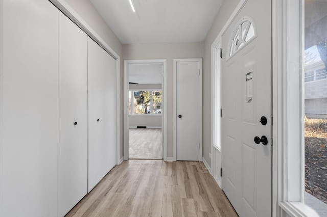 corridor featuring light hardwood / wood-style flooring