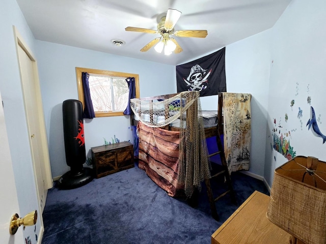 carpeted bedroom featuring visible vents and ceiling fan