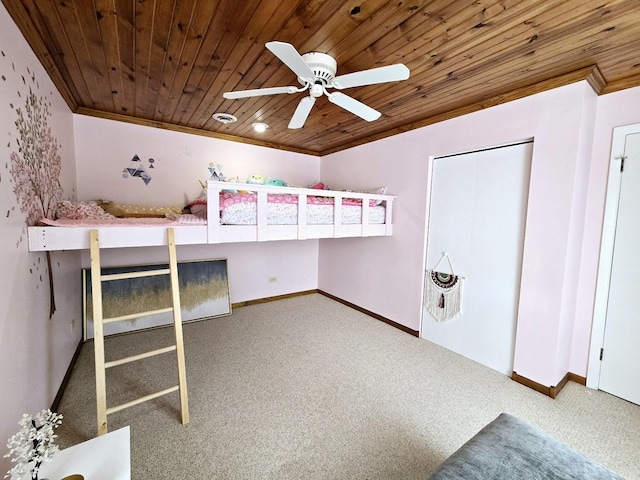 unfurnished bedroom with wood ceiling, baseboards, and ornamental molding