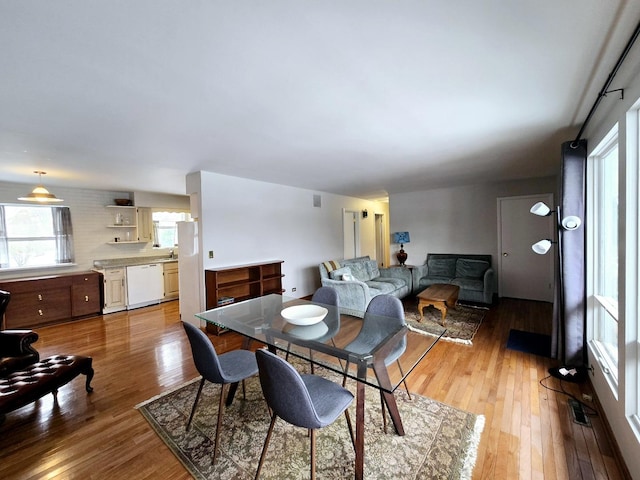 dining area with light wood-type flooring