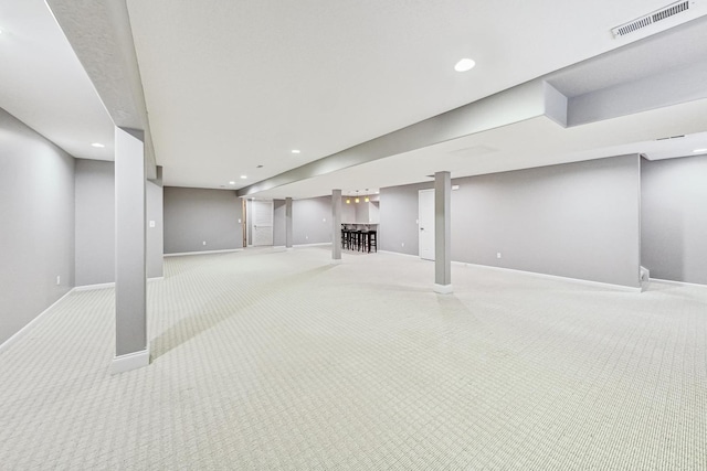 basement with light carpet