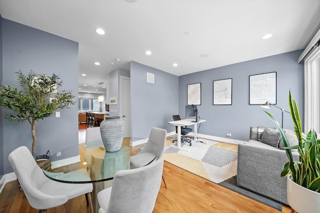 dining room featuring hardwood / wood-style flooring