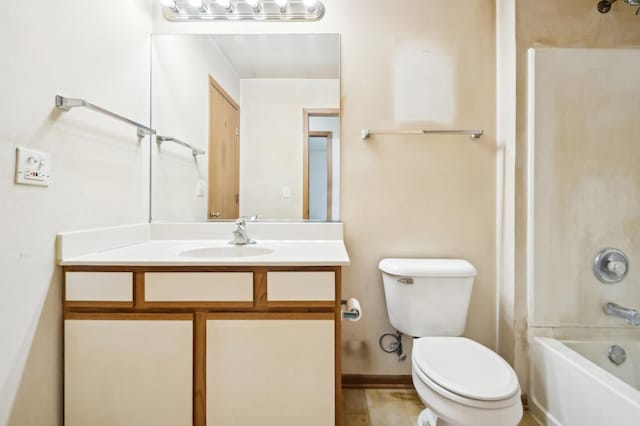 full bathroom featuring toilet, vanity, and bathtub / shower combination