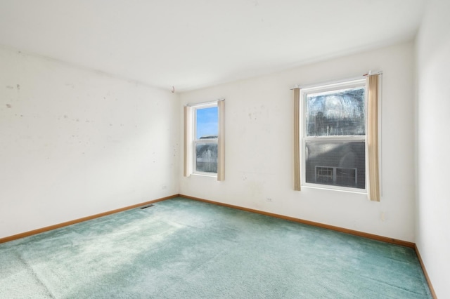 view of carpeted spare room