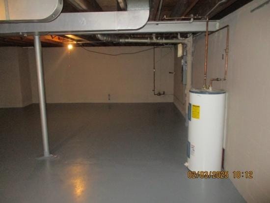 basement featuring water heater