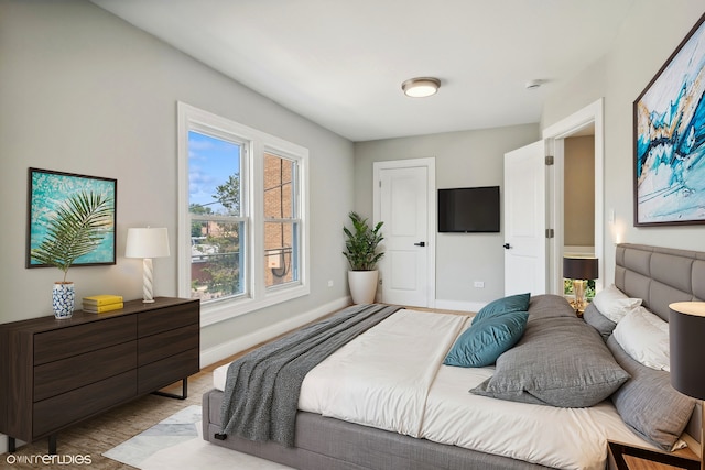 bedroom featuring light hardwood / wood-style floors