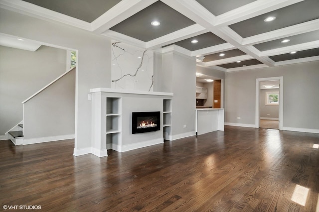 unfurnished living room with dark wood-type flooring, crown molding, beam ceiling, and coffered ceiling