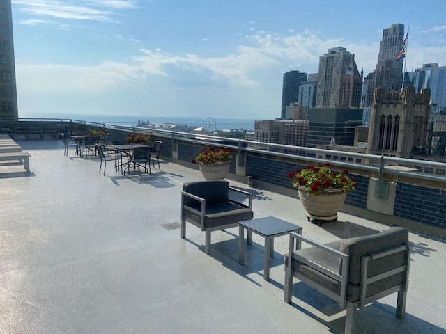 view of patio / terrace with a water view