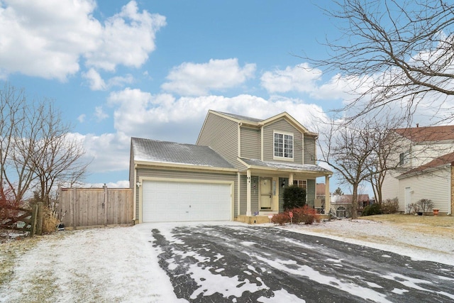 view of front of property with a garage