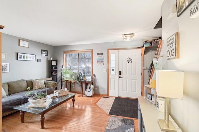 living room with light hardwood / wood-style flooring