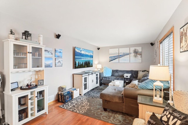 living room with wood-type flooring