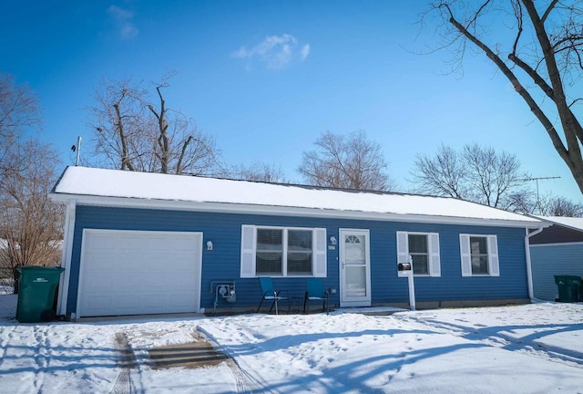 single story home featuring a garage