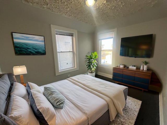 bedroom featuring a textured ceiling