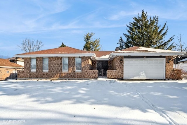 single story home with a garage