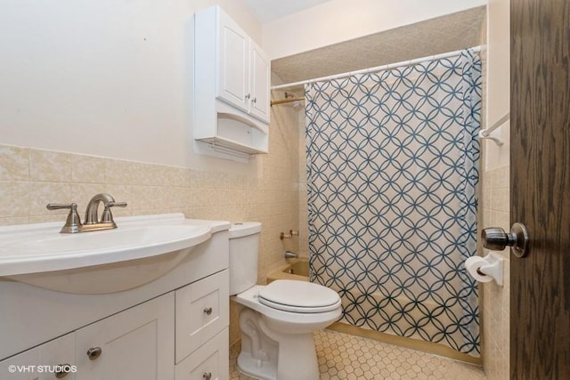 full bathroom featuring vanity, tile walls, toilet, and shower / tub combo with curtain