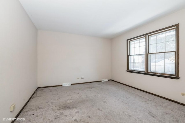 view of carpeted spare room